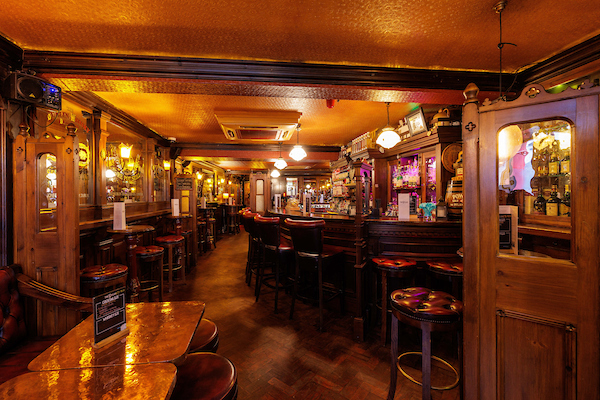 Interior view of The Dylan Whisy Bar showing Irish Whiskey drinks of the bar